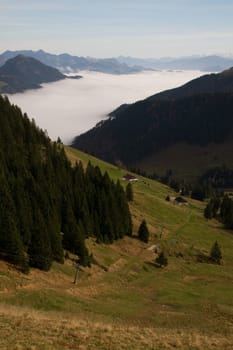 mountain view,valley,cloud,overcast,morning,meadow,green,spring,summer,haze,bell,alpine valley,foothills of the Alps,Bayrischzell,ski area,hiking