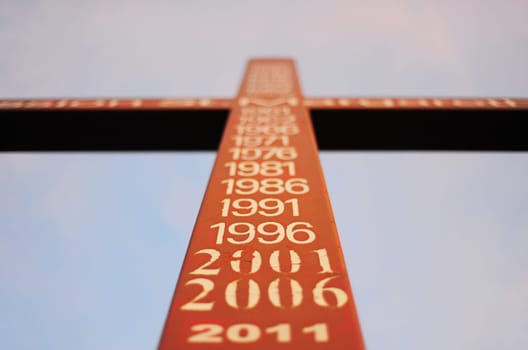 Cross with dates
