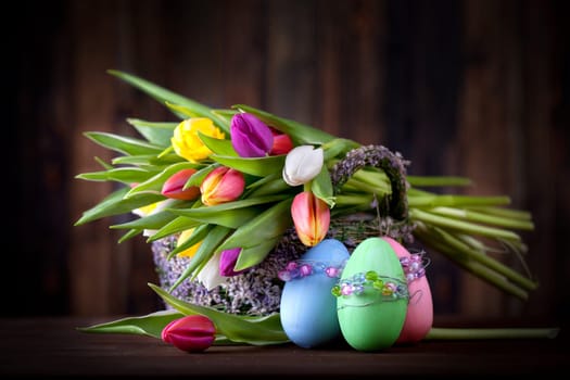 colorful Easter eggs and tulips
