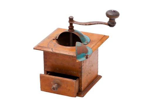 Nostalgic wooden coffee grinder insulated against a white background