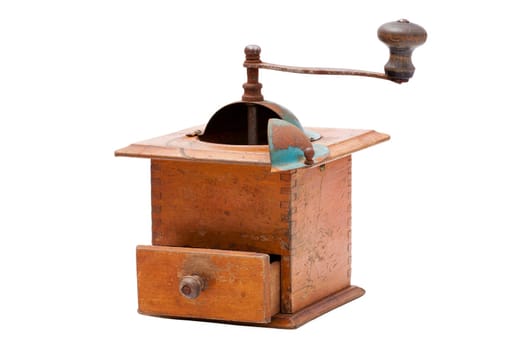 Nostalgic wooden coffee grinder insulated against a white background
