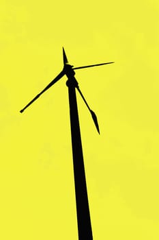 Wind turbines generating electricity on silhouettes