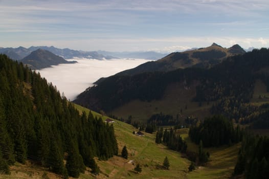 mountain view,valley,cloud,overcast,morning,meadow,green,spring,summer,haze,bell,alpine valley,foothills of the Alps,Bayrischzell,ski area,hiking