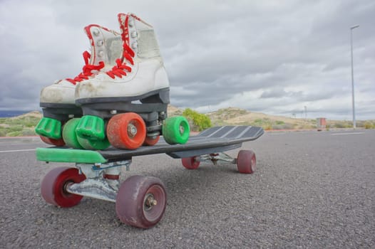 hdr picture of Vintage Style Longboard Black Skateboard on an Empty Asphalt Desert Road