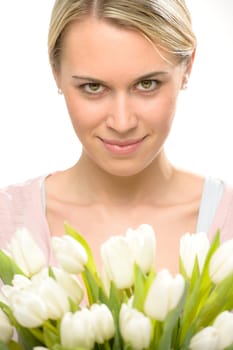 Romantic woman with bouquet of white tulip flowers