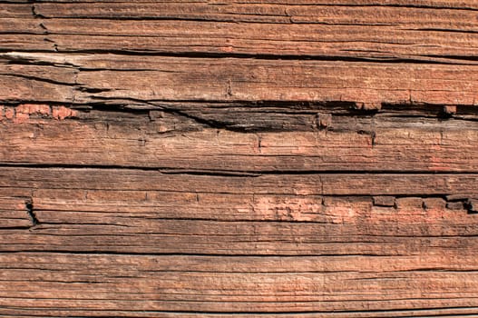 Old grunge weathered wooden railway wagon board closeup as background