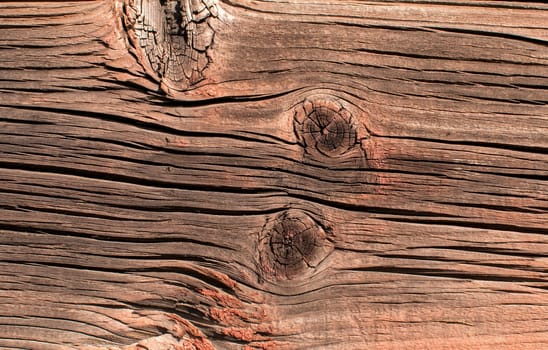 Old grunge weathered wooden railway wagon board closeup as background