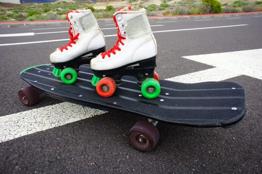 Old Vintage White Skate Boot on the Asphalt Sterret