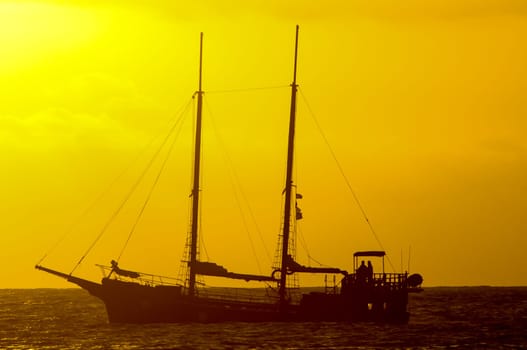 Antique Vintage Sail Vessel on the Ocean at Sunset