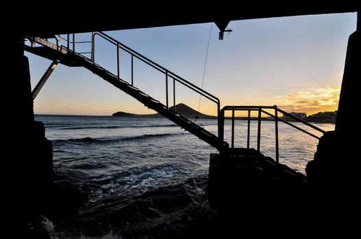 Sunset on the Atlantic Ocean with a Mountain in Background El Medano Tenerife Canary Islands Spain