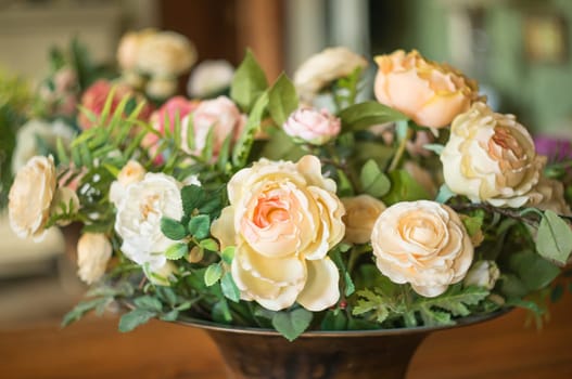 Magnificent bouquet consisting of roses in pink and beige.