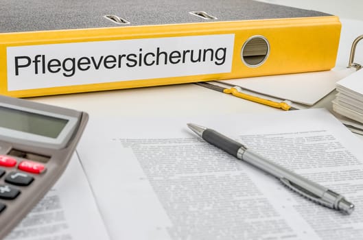 File folder labeled long-term care insurance