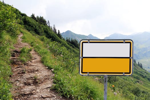Empty town sign in the mountains