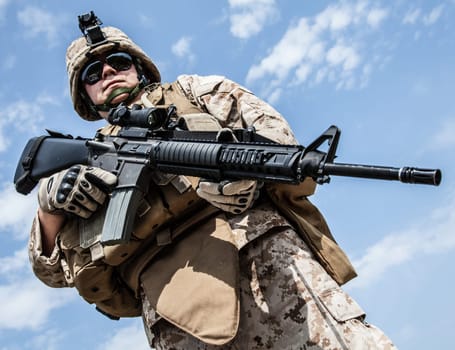 Close-up photo of US marine with his rifle