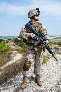 Close-up photo of US marine with his rifle
