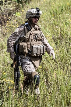 Close-up photo of US marine with his rifle