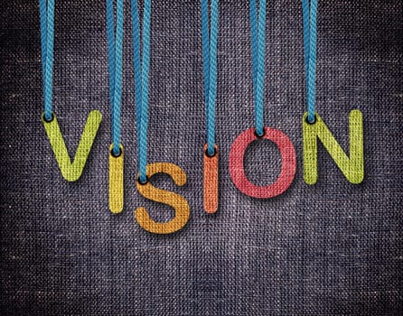 Vision Letters hanging strings with blue sackcloth background.