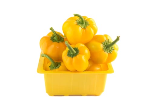 Sweet Yellow pepper in yellow box on a white. (clipping work path included)