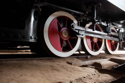 Train red weels shot from ground. Industry. Transport concept