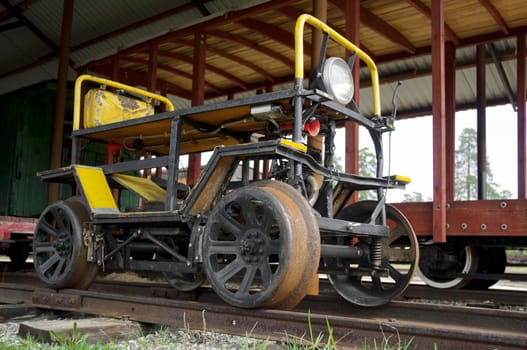 Fuel powered trolley for two person with electric lamp forehead