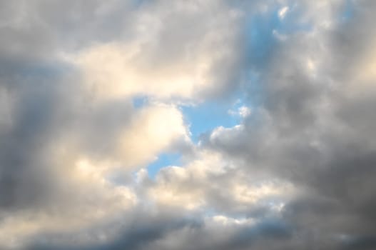 Cloudscape, Colored Clouds at Sunset near the Ocean