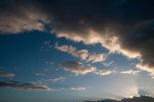 Cloudscape, Colored Clouds at Sunset near the Ocean