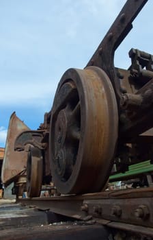 Train old rust weels shot from ground. Industry. Transport concept