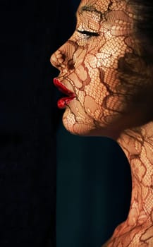 Creative Art Makeup. Portrait of Asian Woman in Sunlight with Tracery
