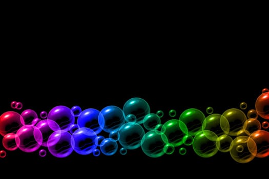 Bubbles in rainbow colors on a black background
