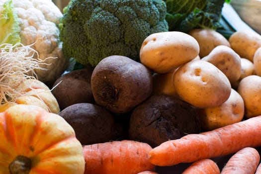 Winter vegetables including beetroot, carrots and potatoes.