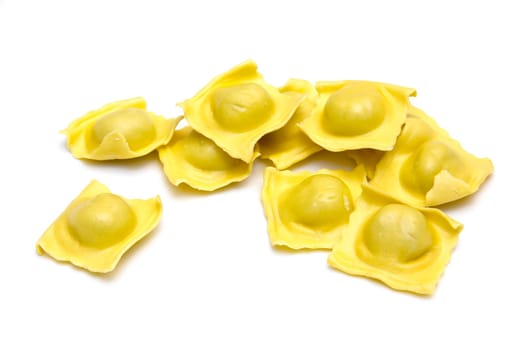 Ravioli arranged on white background