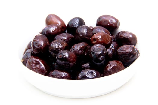 Black olives on white background