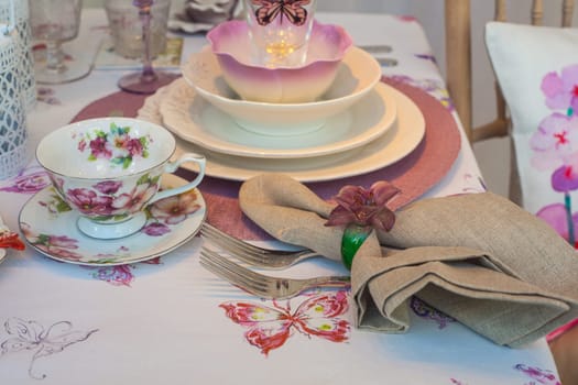 View of ceramic dishes of the elegant table set