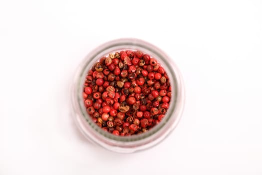 Paprika powder in a glass pot.