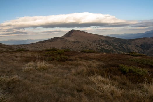 Rain clouds over the plateau in the mountains