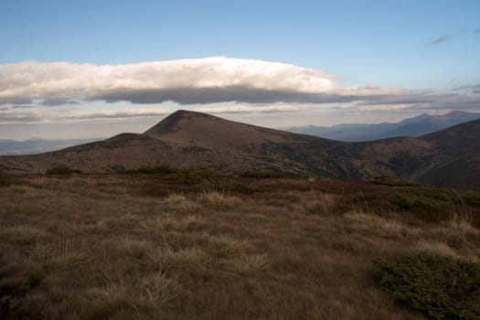 Rain clouds over the plateau in the mountains