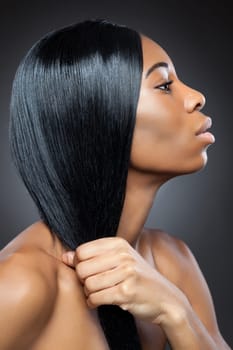 Young black beauty with long straight hair