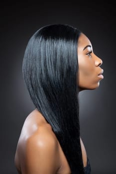Young black beauty with long straight hair