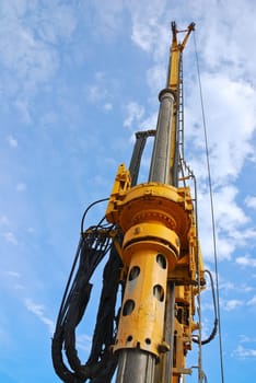 Guide rail of an auger on the construction site