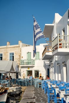 People having dinner in the port of Naoussa, Paros, Greece