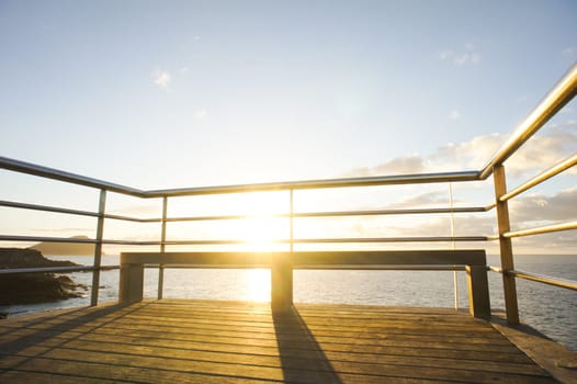 HDR Picture Sunrise on a Pier over Atlantic Ocean in Tenerife Canary Islands Spain