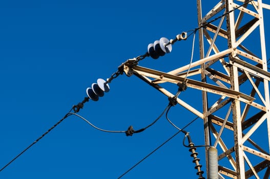 Energy Electricity Power Pylon on a Blue Sky
