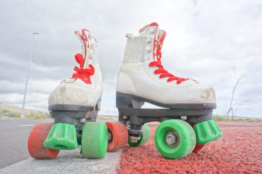 Hdr Picture of Old Vintage White Skate Boot on the Asphalt Sterret