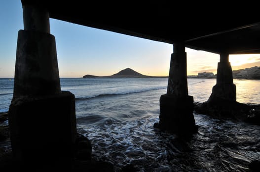 Sunset on the Atlantic Ocean with a Mountain in Background El Medano Tenerife Canary Islands Spain