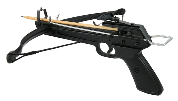 Metal crossbow handgun with wooden pencil isolated on white.