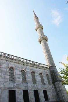 A closeup view of the minaret of the mosque in Istanbul, Turkey...
