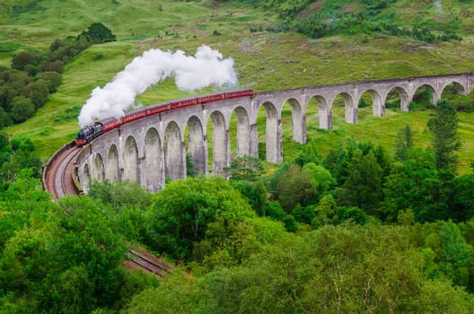 Detail of steam train on famous Glenfinnan viaduct, Scotland, United Kingdom