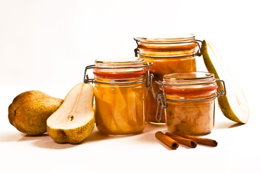 Preserved fruit in preserving jars and fresh