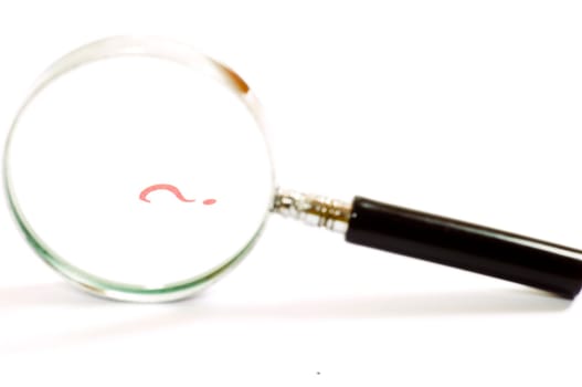 Magnifying glass on white background with question mark