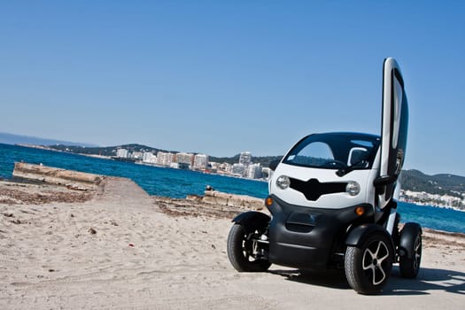 Electric car and beach background